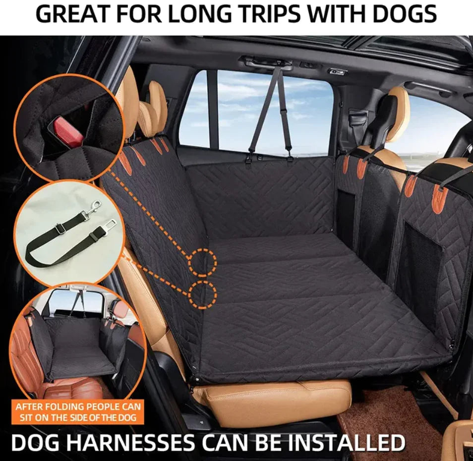 Quilted black dog car seat cover with harness attachments for safe pet travel, fits backseat.