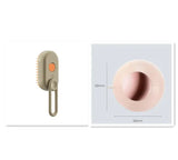 Electric pet grooming brush with ergonomic handle and circular side view, 68mm dimensions shown